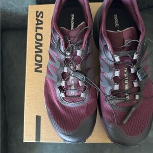 Salomon Red and Black Athletic Shoes with Mesh Upper